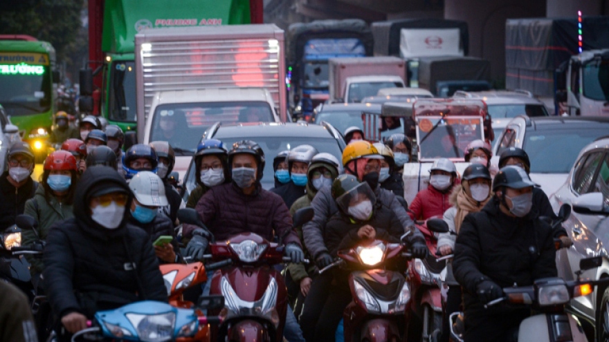 Locals rush back to Hanoi, HCM City after New Year holiday